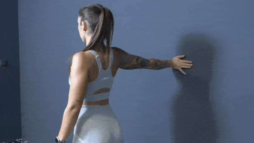 Разтягане на китката на стената Разтягане на китката на стената